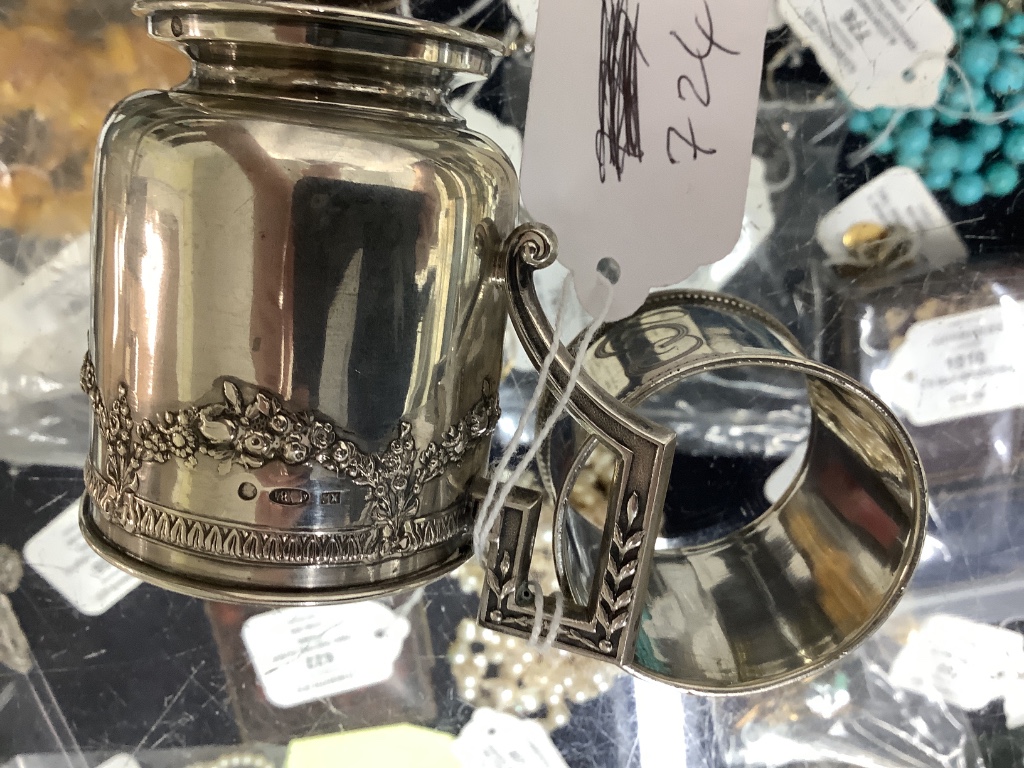 Two early 20th century Russian 84 zolotnik cups and saucers, one other saucer, napkin ring and sugar bowl